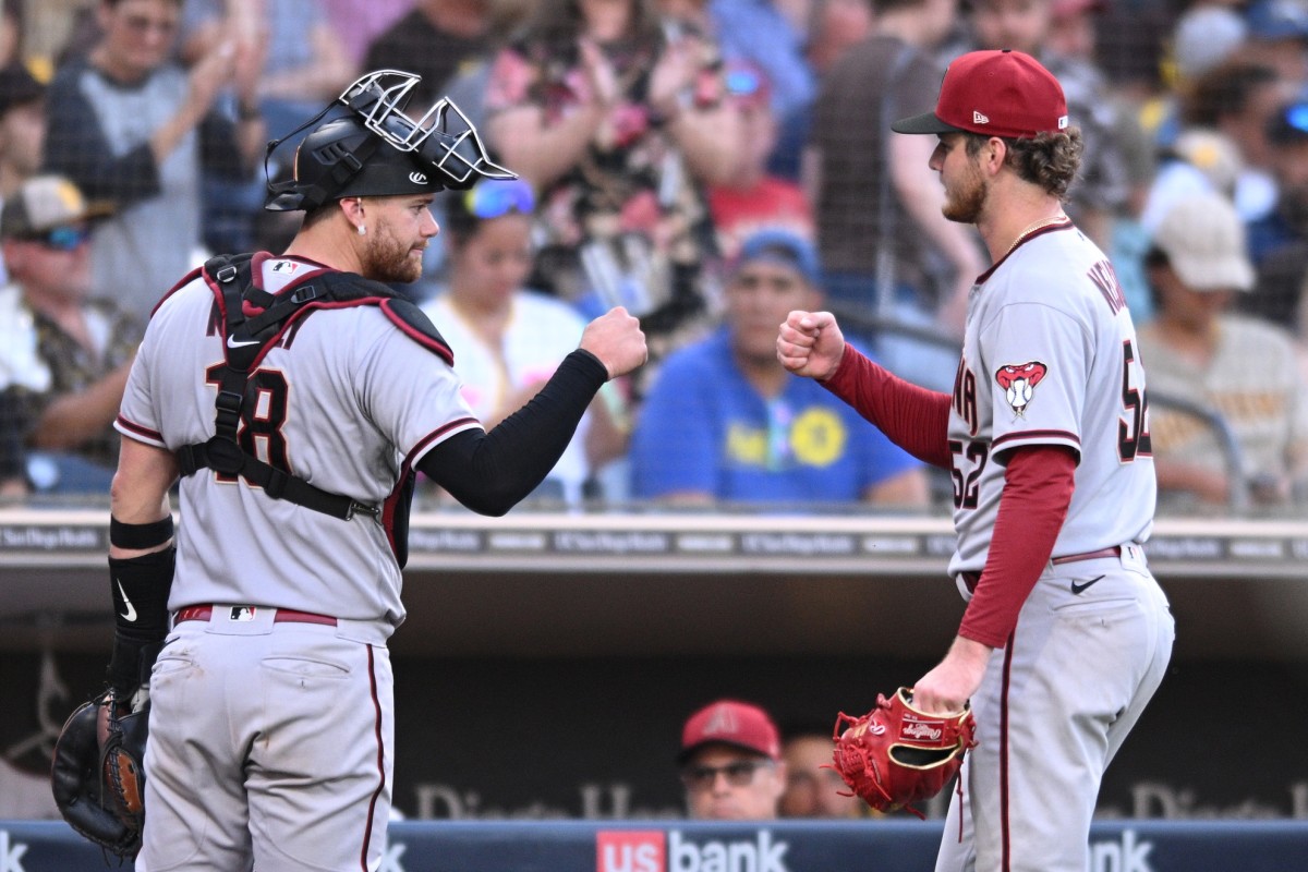 Kyle Nelson celebrates with Carson Kelly