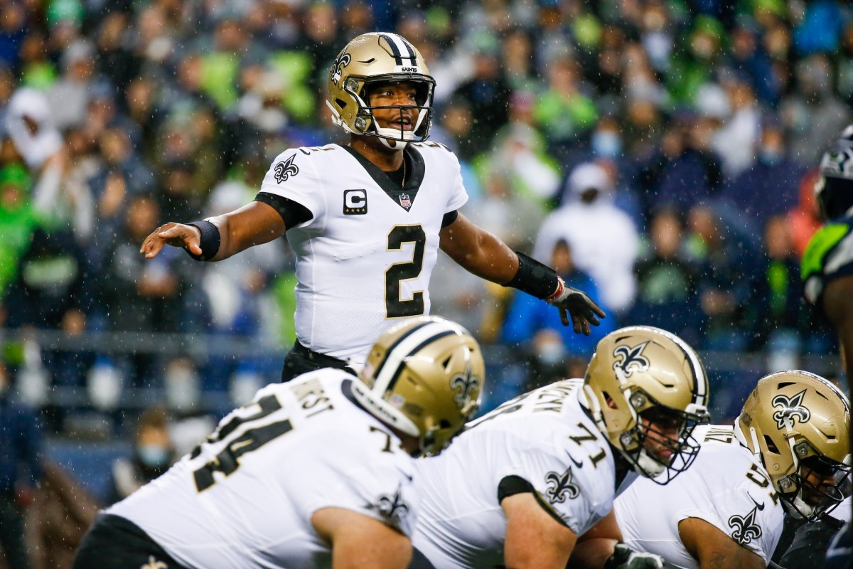 New Orleans Saints quarterback Jameis Winston (2) stands over center. Mandatory Credit: Joe Nicholson-USA TODAY Sports
