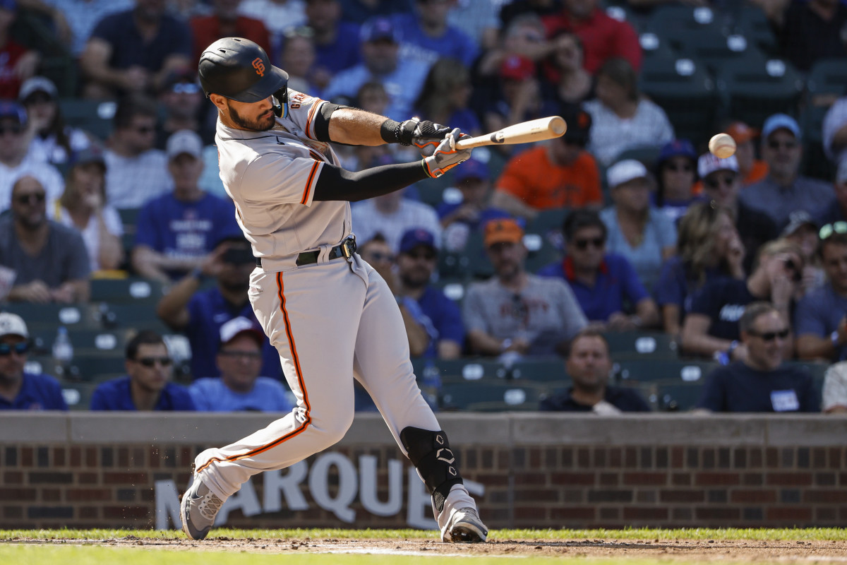 SF Giants infielder David Villar hits a double against the Cubs.