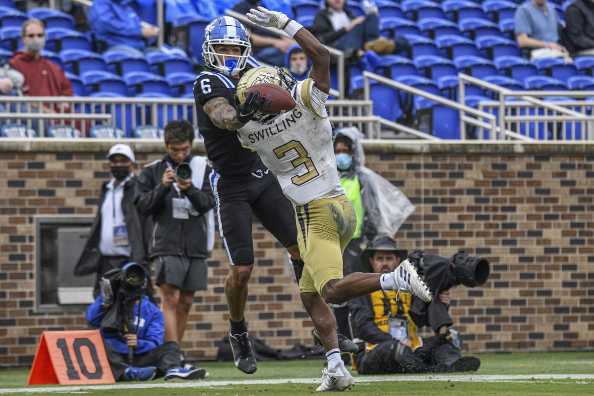 Oct 9, 2021; Duke receiver Eli Pancol (6) reaches for a pass against Georgia Tech Yellow Jackets defensive back Tre Swilling (3). Mandatory Credit: William Howard-USA TODAY Sports