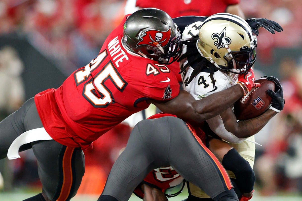 Dec 19, 2021; New Orleans Saints running back Alvin Kamara (41) is tackled by Tampa Bay Buccaneers linebacker Devin White (45). Mandatory Credit: Nathan Ray Seebeck-USA TODAY Sports