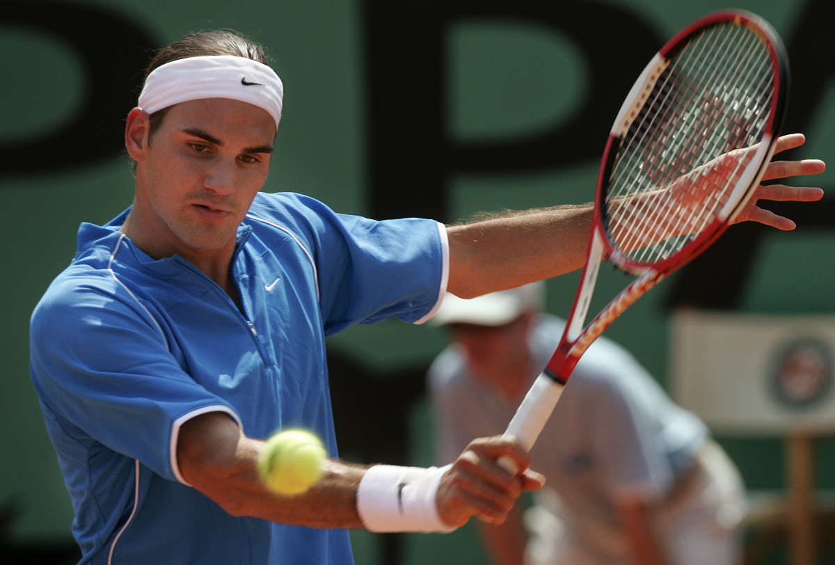 Roger Federer returns a shot at the 2004 French Open.