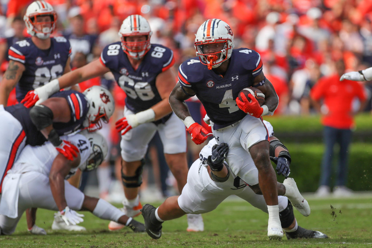 Tank Bigsby carries the ball against Penn State.