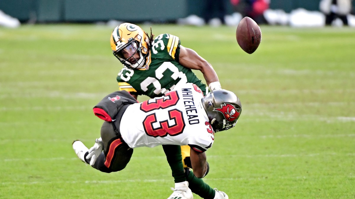 Then-Buccaneers safety Jordan Whitehead forced a fumble by Packers running back Aaron Jones to start the second half of the 2020 NFC Championship Game. (Photo by Benny Sieu/USA Today Sports)