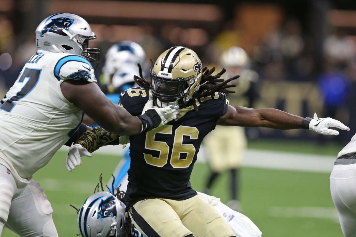 Jan 2, 2022; New Orleans Saints linebacker Demario Davis (56) works against Carolina Panthers guard John Miller (67). Mandatory Credit: Chuck Cook-USA TODAY Sports