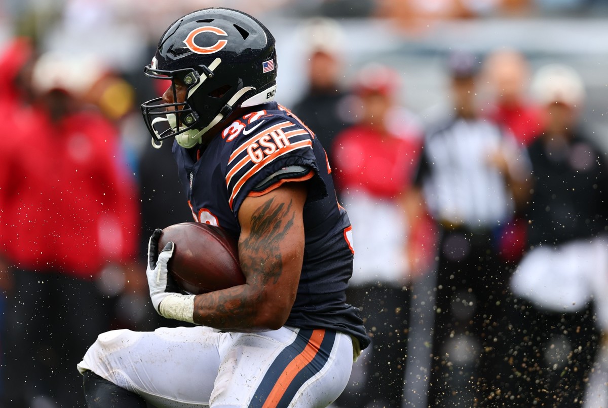 Sep 11, 2022; Chicago, Illinois, USA; Chicago Bears running back David Montgomery (32) rushes the ball against the San Francisco 49ers during the first quarter at Soldier Field.