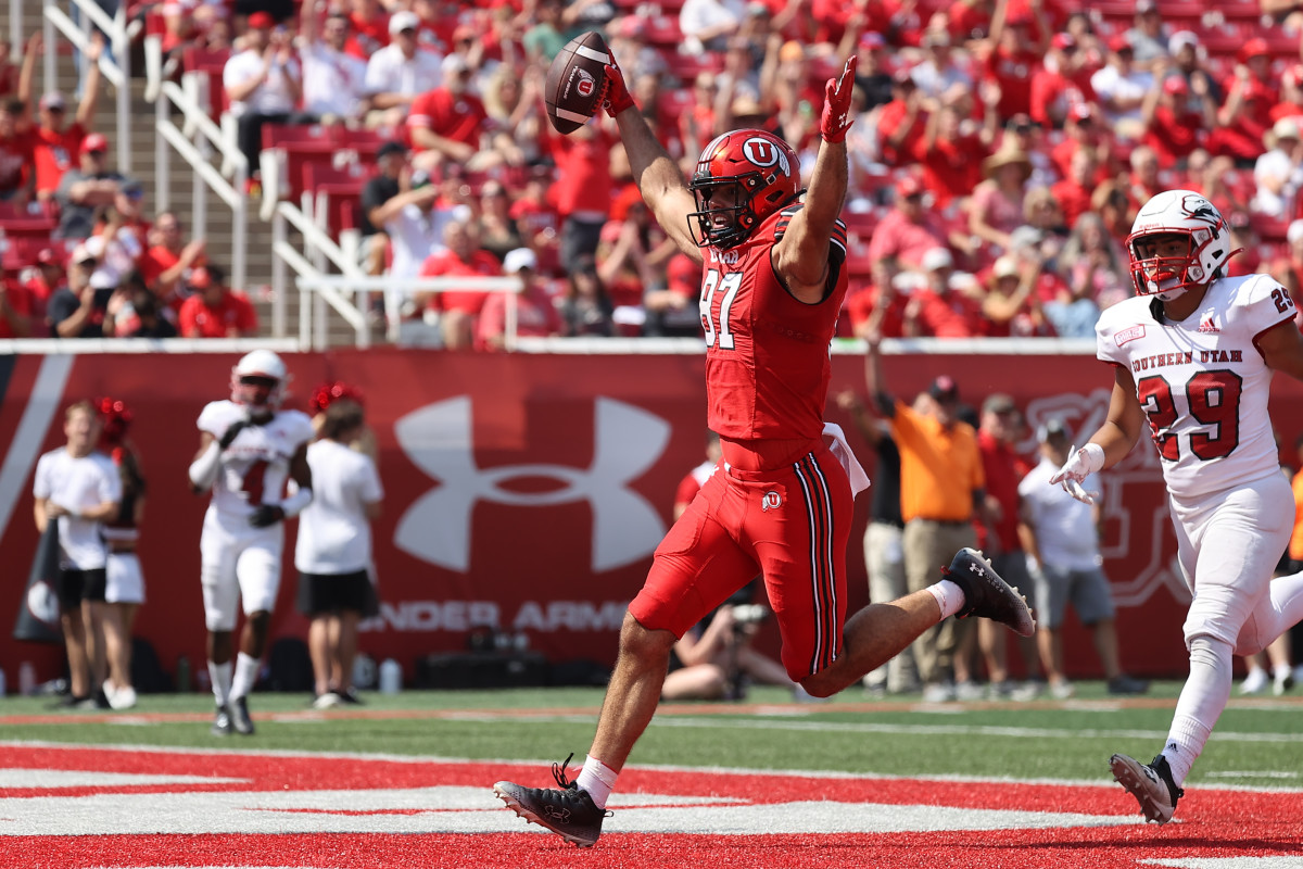 Utah Utes tight end Thomas Yassmin (87) celebrates scoring a touchdown in the fourth quarter against the Southern Utah Thunderbirds at Rice-Eccles Stadium.