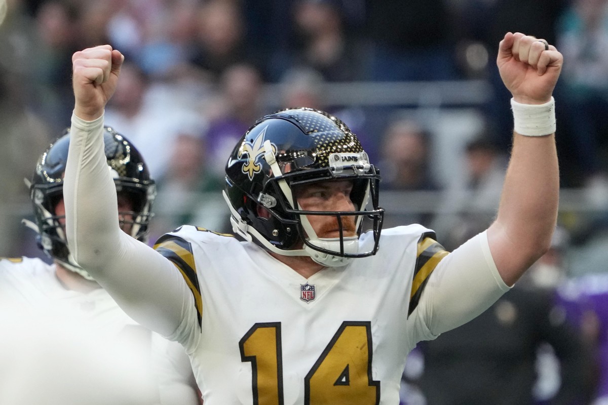 Saints QB Andy Dalton celebrates a touchdown