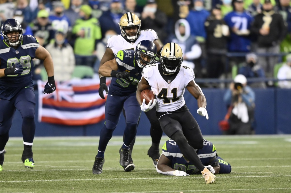 New Orleans Saints running back Alvin Kamara (41) runs the ball against the Seattle Seahawks. Mandatory Credit: Steven Bisig-USA TODAY Sports
