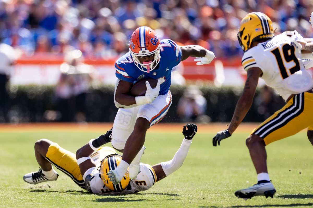 Florida Gators running back Trevor Etienne (7) runs with the ball during the second half against the Missouri Tigers at Steve Spurrier Field at Ben Hill Griffin Stadium in Gainesville, FL on Saturday, October 8, 2022.