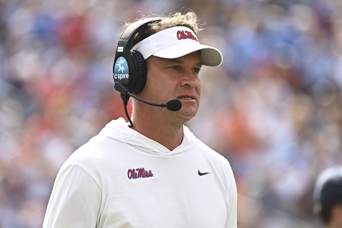Oct 15, 2022; Oxford, Mississippi, USA; Mississippi Rebels head coach Lane Kiffin walks off the field during a timeout during the first quarter of the game against the Auburn Tigers at Vaught-Hemingway Stadium. Mandatory Credit: Matt Bush-USA TODAY Sports