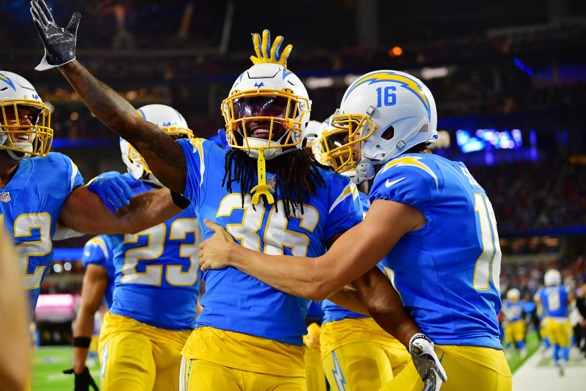 #36 Ja'Sir Taylor celebrates with teammates after his big play