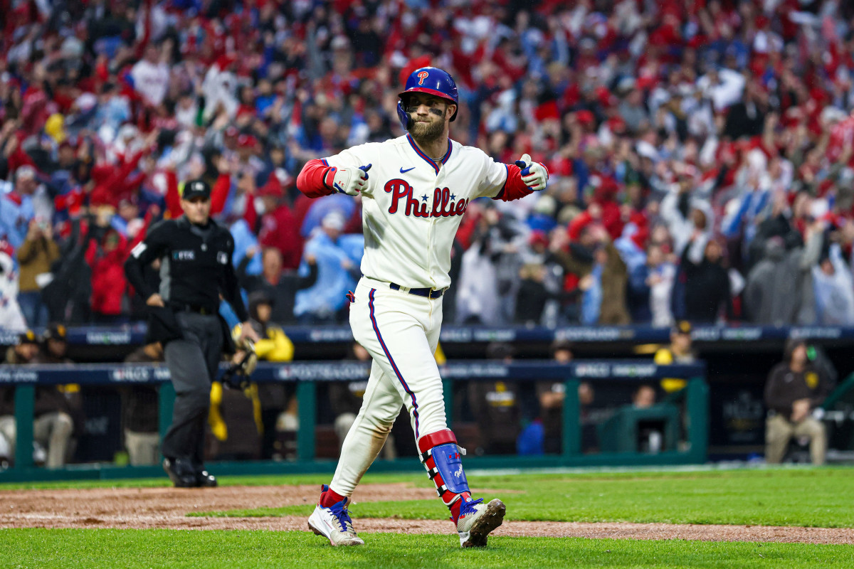 Bryce Harper reacts after hitting a two-run home run to clinch the NL pennant.