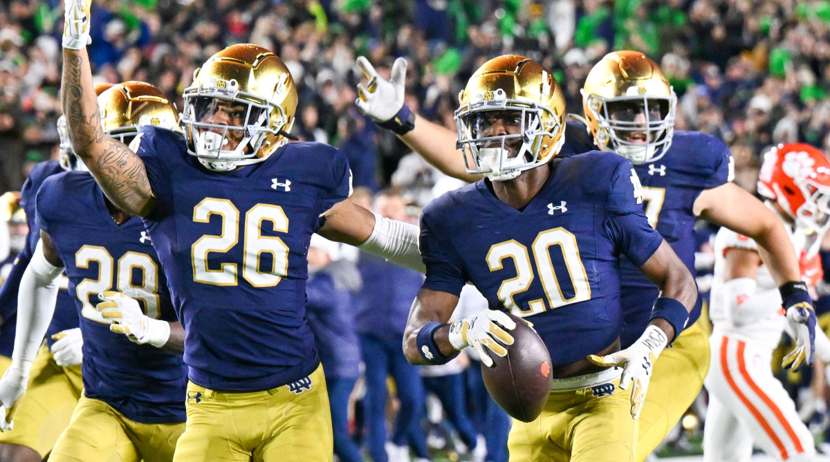 Notre Dame celebrates an interception.