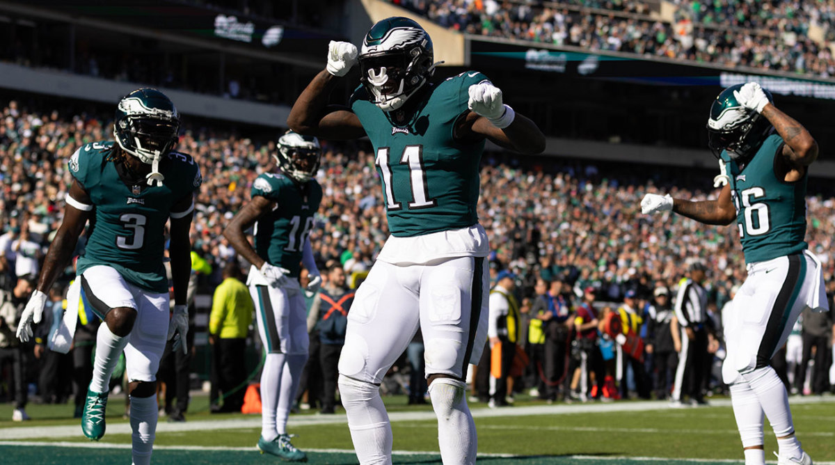 A.J. Brown and some Eagles teammates dance in the end zone.