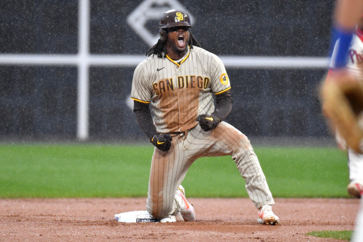 Bell slides safely into second after plating the tying run in Game 5 of the NLCS.
