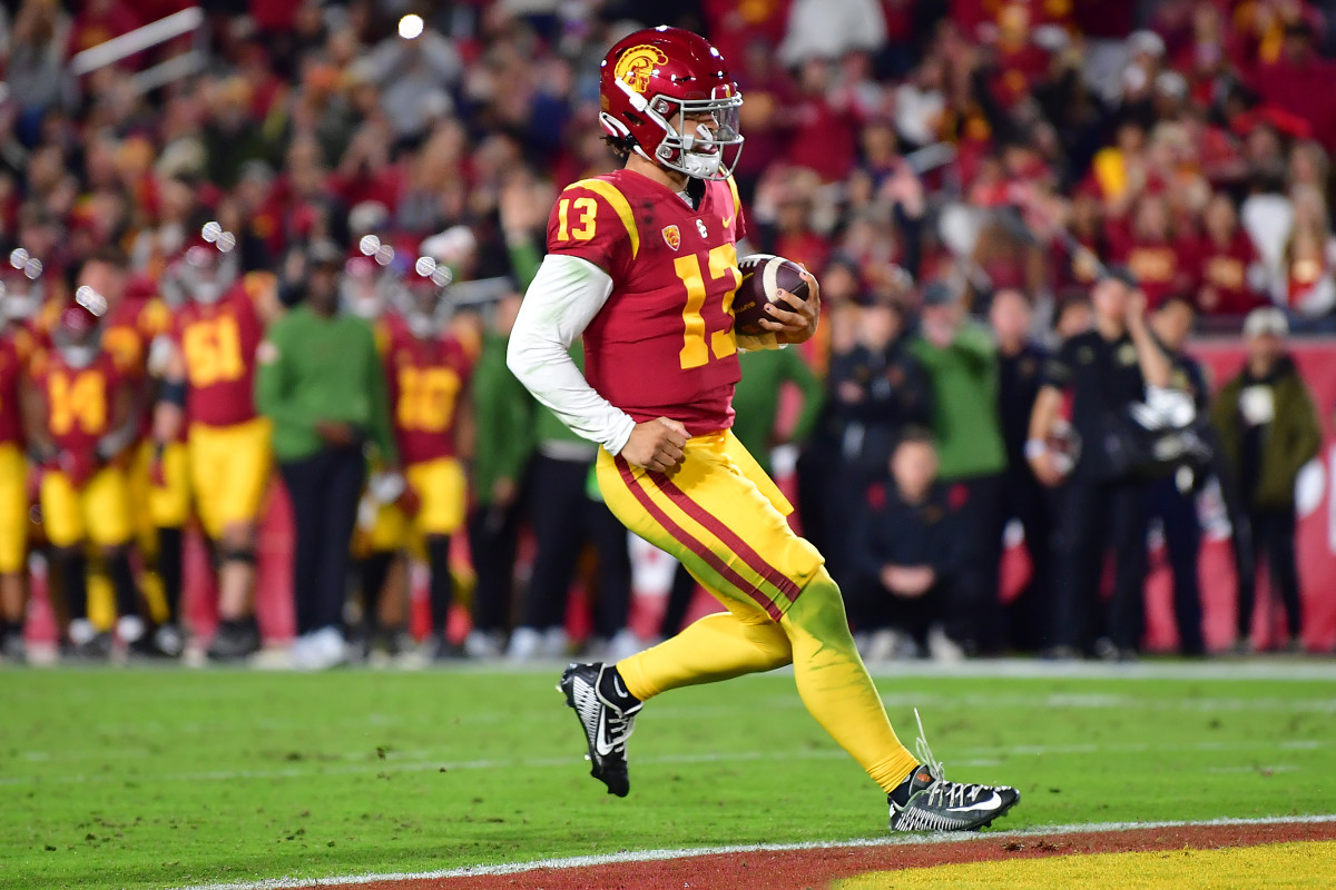 Trojans quarterback Caleb Williams scores a rushing touchdown