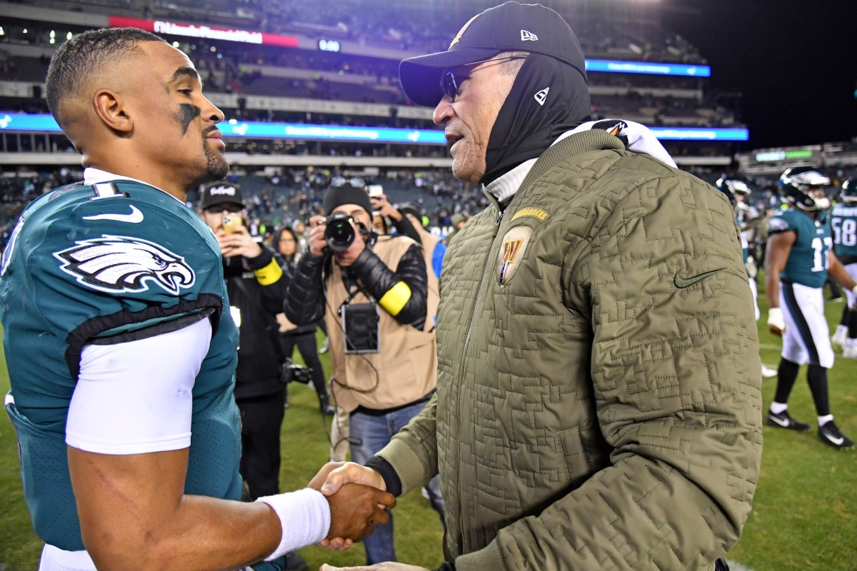 Jalen Hurts and Washington coach Ron Rivera after Commanders win in Week 10 of the 2022 season