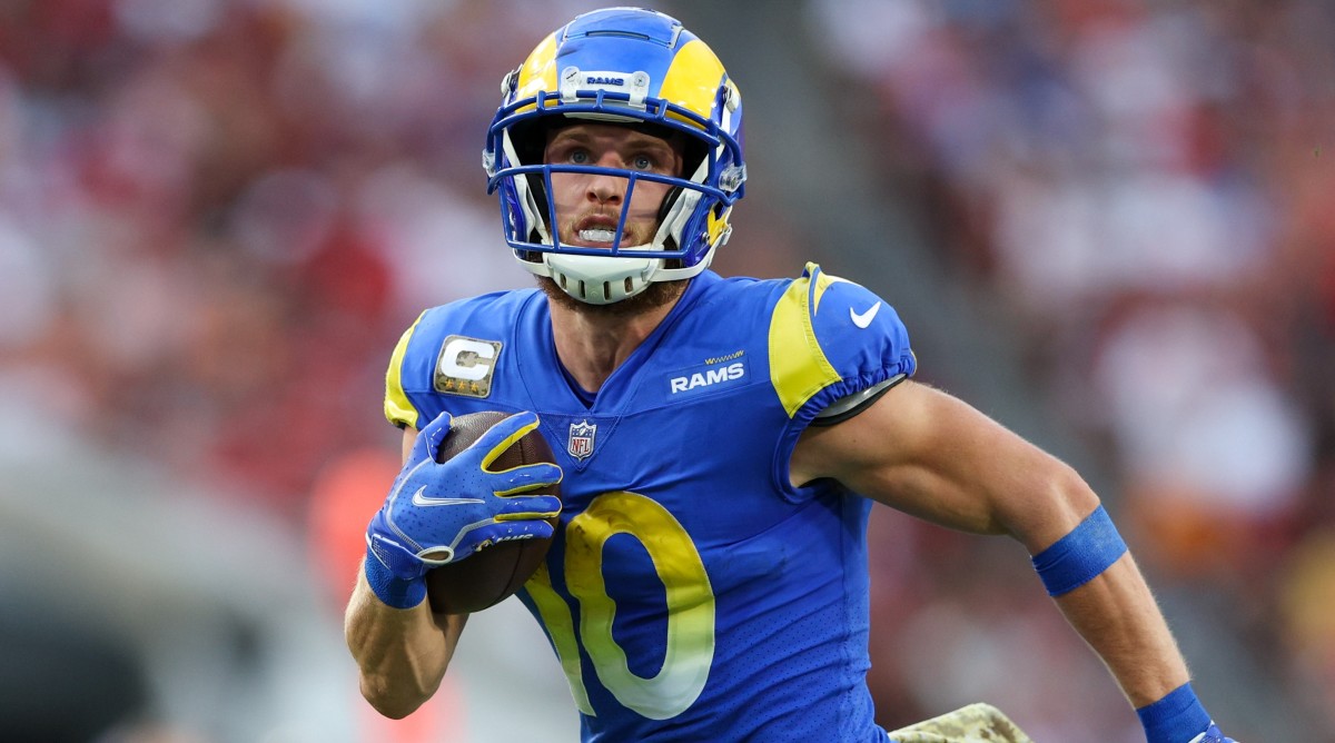 Rams wide receiver Cooper Kupp (10) runs for a touchdown during a game against the Buccaneers.
