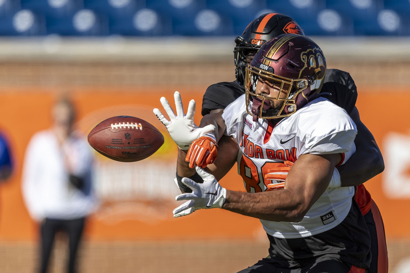 Jan 31, 2024; Mobile, AL, USA; National tight end Brevyn Spann-Ford of Minnesota (88) fights off National defensive back Kitan Oladapo of Oregon State (28) for a pass during practice for the National team at Hancock Whitney Stadium. Mandatory Credit: Vasha Hunt-USA TODAY Sports  