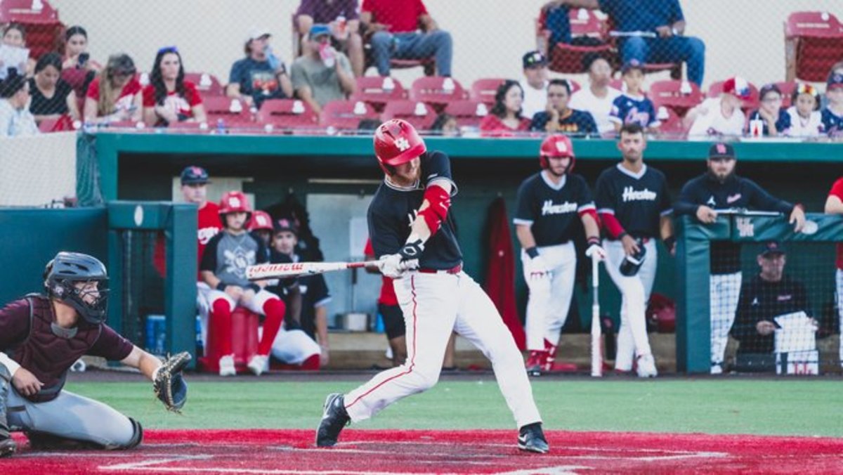 Cameron Nickens drives in a run for Team White in a Fall scrimmage. 