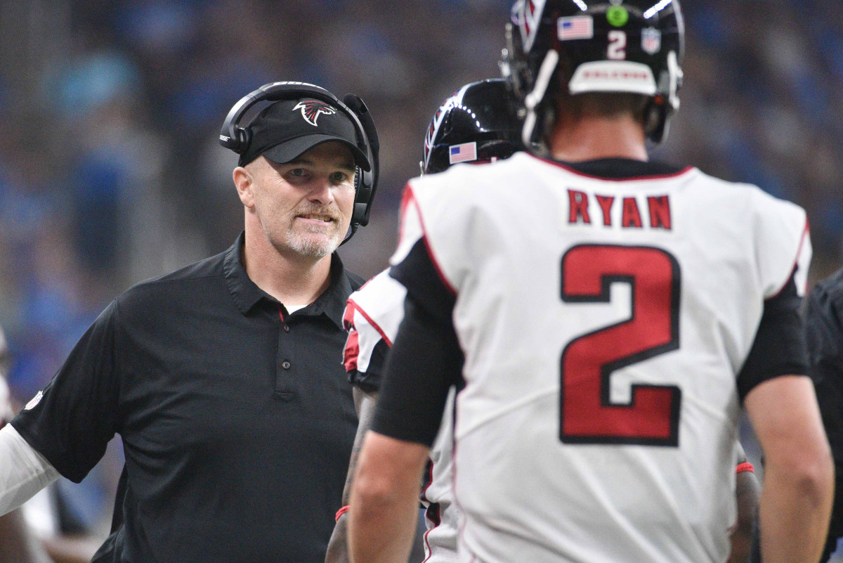 Sep 24, 2017; Detroit, MI, USA; Atlanta Falcons head coach Dan Quinn high fives quarterback Matt Ryan (2) during the fourth quarter against the Detroit Lions at Ford Field.