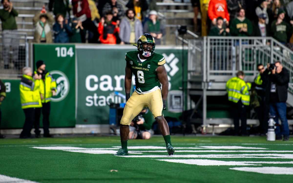 CSU football's senior defensive lineman Mohamed Kamara (8) celebrates his sack for a safety.