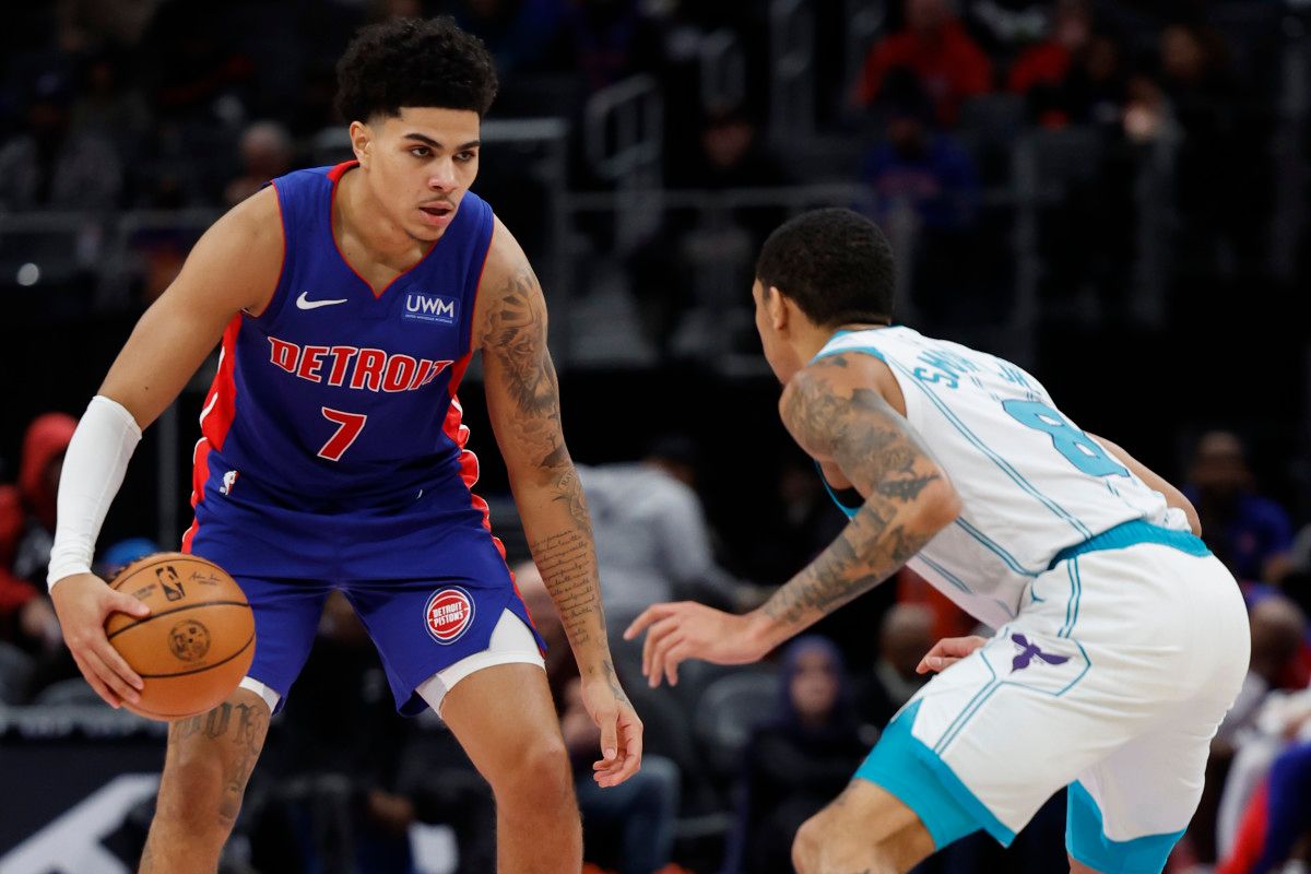 Jan 24, 2024; Detroit, Michigan, USA; Detroit Pistons guard Killian Hayes (7) dribbles defended by Charlotte Hornets guard Nick Smith Jr. (8) in the first half at Little Caesars Arena. Mandatory Credit: Rick Osentoski-USA TODAY Sports