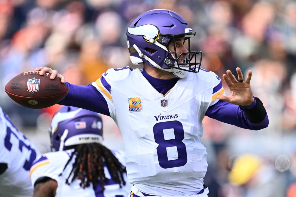 Oct 15, 2023; Chicago, Illinois, USA; Minnesota Vikings quarterback Kirk Cousins (8) passes in the first half against the Chicago Bears at Soldier Field. 