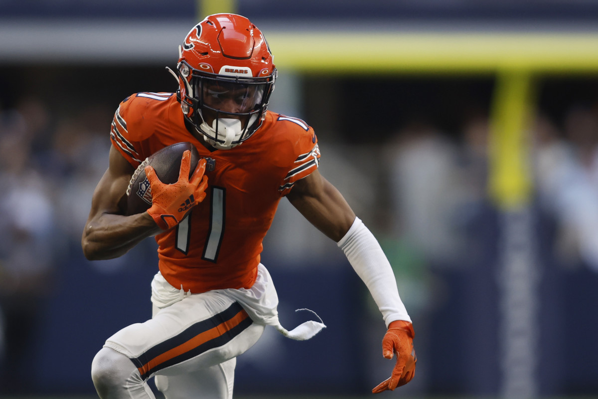 Oct 30, 2022; Arlington, Texas, USA; Chicago Bears wide receiver Darnell Mooney (11) runs for a first down in the third quarter against the Dallas Cowboys at AT&T Stadium.  