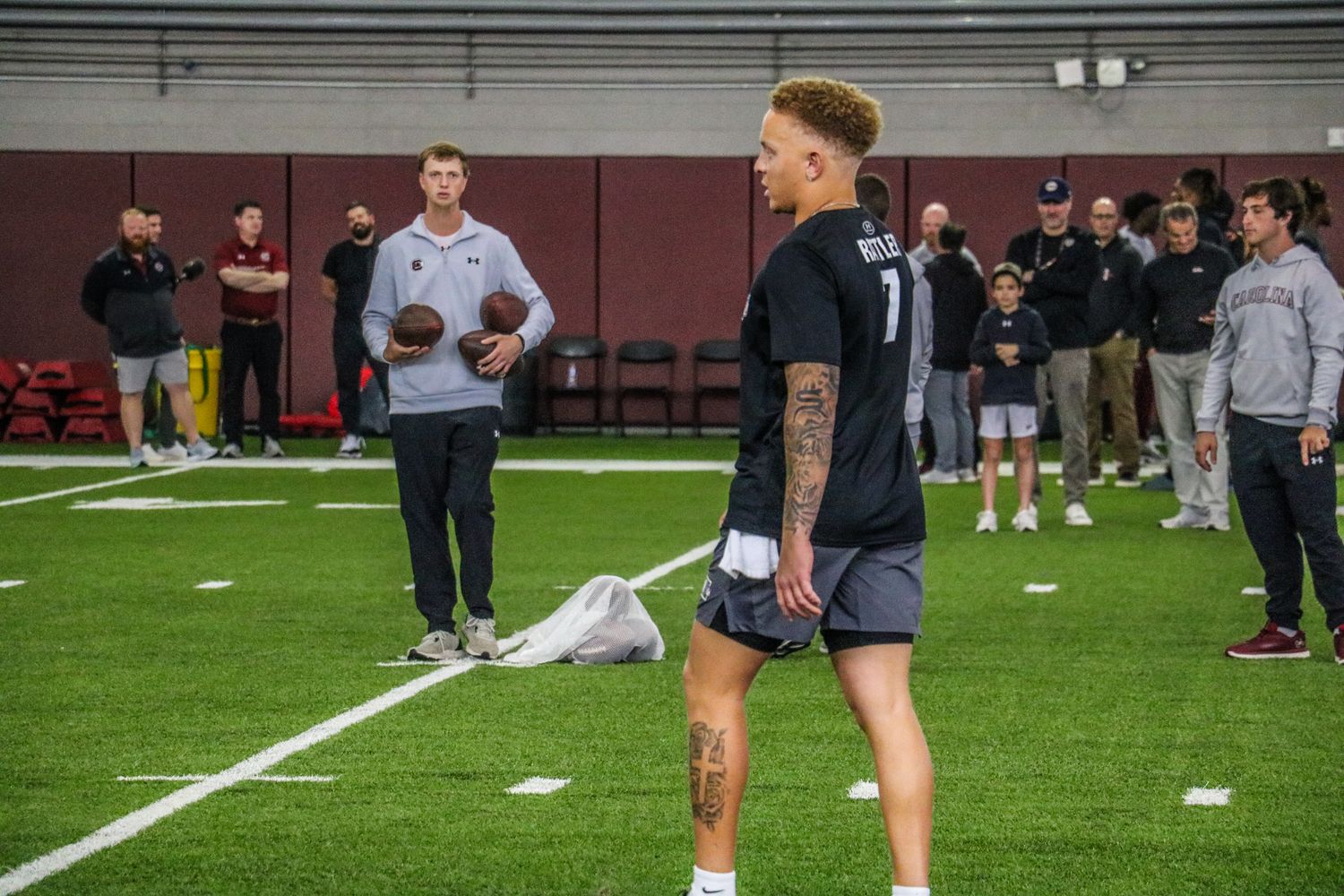 Rattler walks over to his spot during his throwing drills