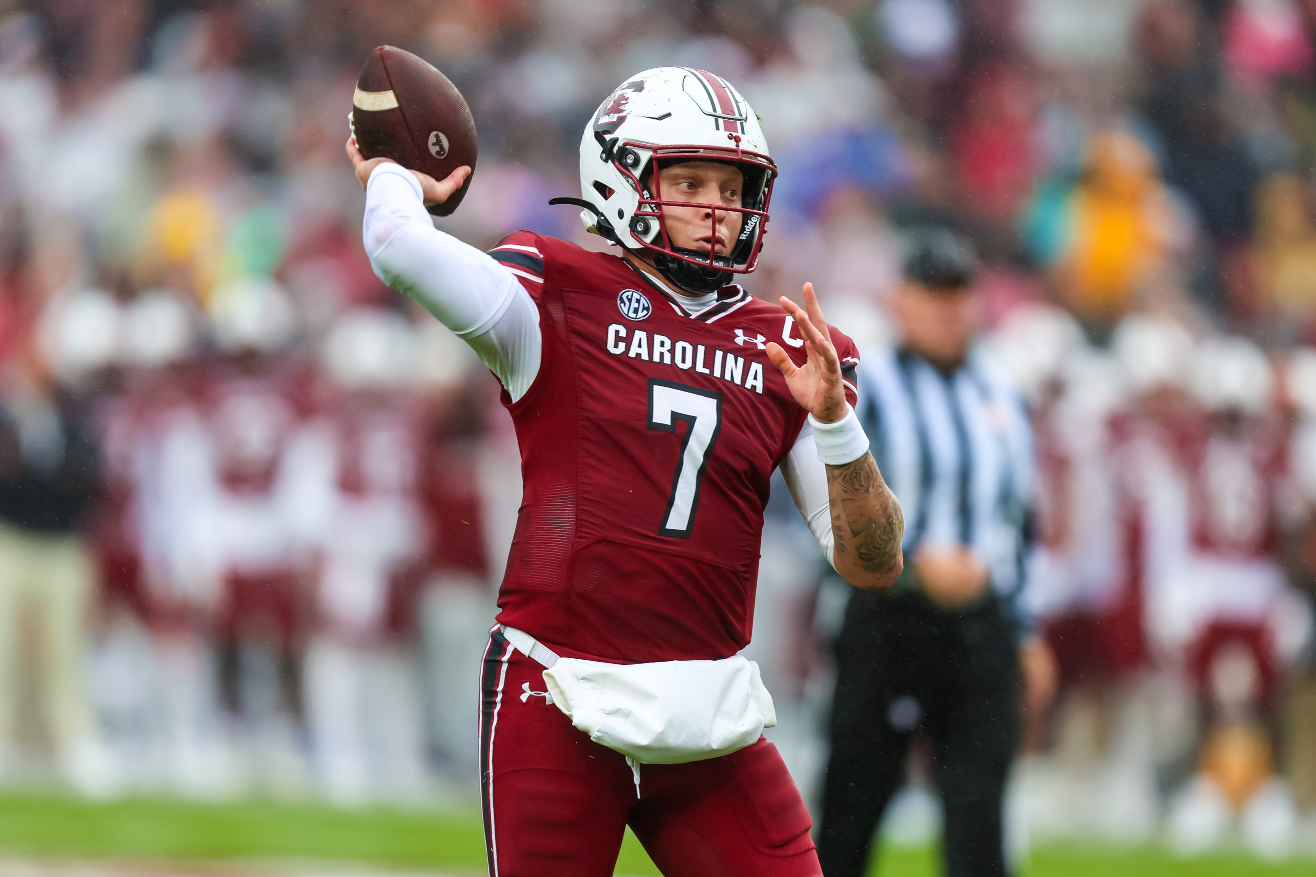 Nov 11, 2023; Columbia, South Carolina, USA; South Carolina Gamecocks quarterback Spencer Rattler (7) throws for a touchdown against the Vanderbilt Commodores in the first quarter at Williams-Brice Stadium.