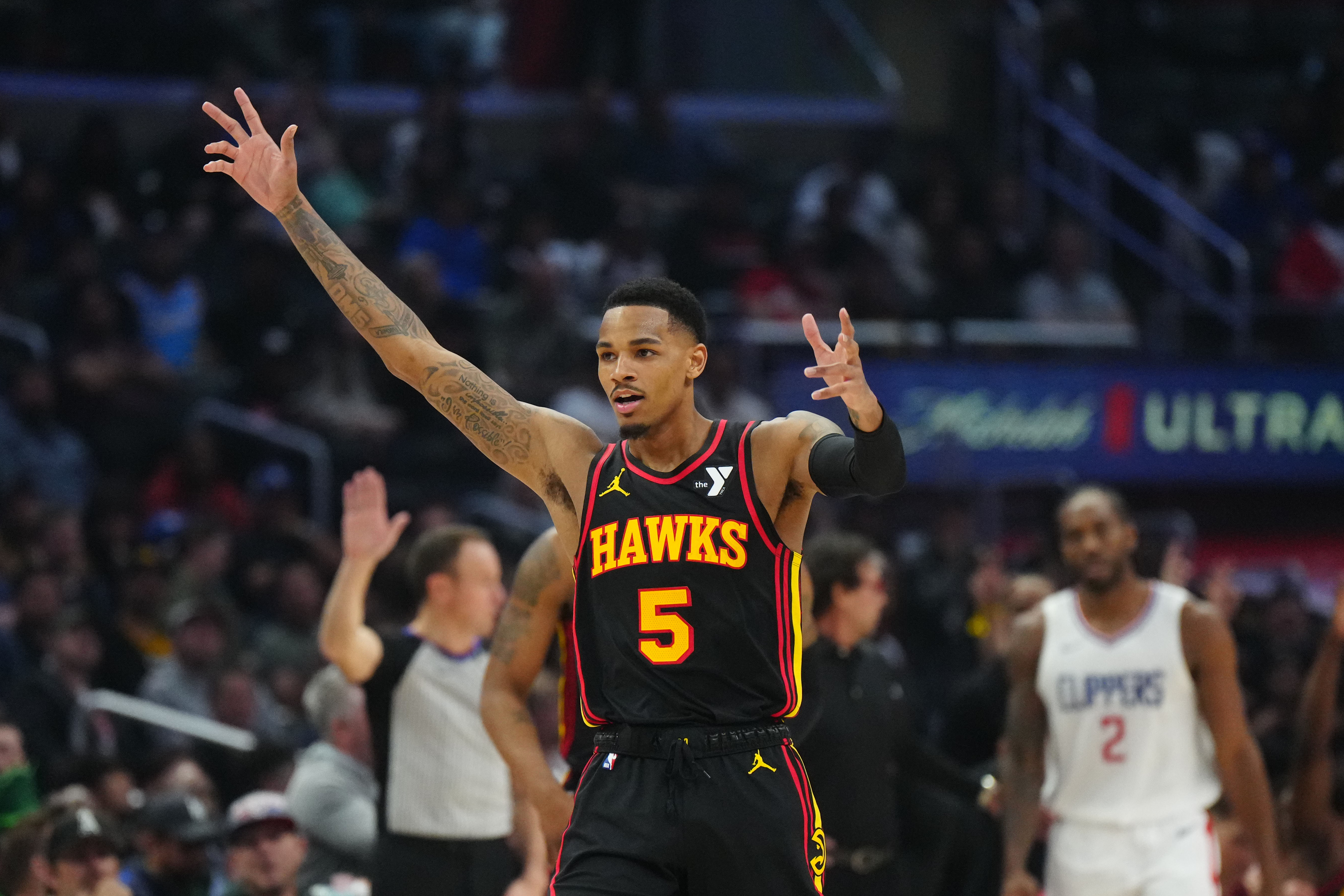 Mar 17, 2024; Los Angeles, California, USA; Atlanta Hawks guard Dejounte Murray (5) celebrates against the LA Clippers in the first half at Crypto.com Arena. Mandatory Credit: Kirby Lee-USA TODAY Sports