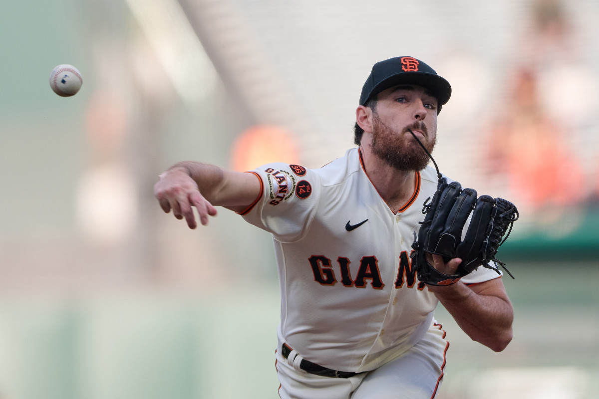 SF Giants starting pitcher Ryan Walker throws a pitch against the Tampa Bay Rays during the first inning at Oracle Park on August 14, 2023.