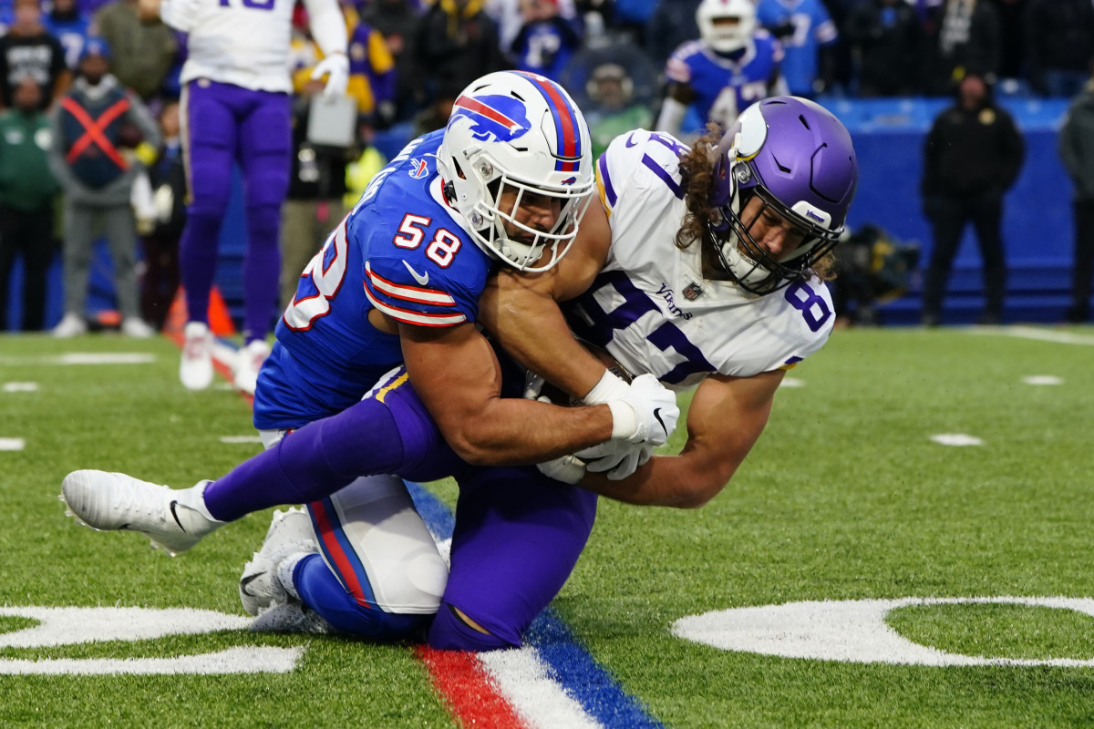 linebacker Matt Milano (58) tackles T.J. Hockenson