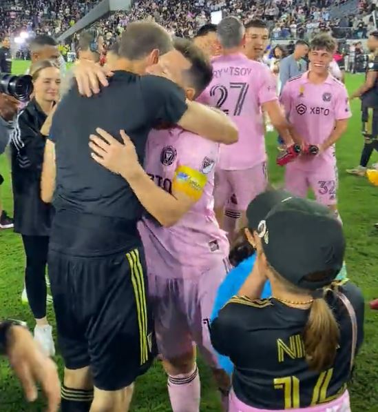 Giorgio Chiellini (left) and Lionel Messi pictured sharing a hug after Messi had posed for a photo with Chiellini's eight-year-old daughter Nina following Inter Miami's 3-1 win over LAFC in September 2023