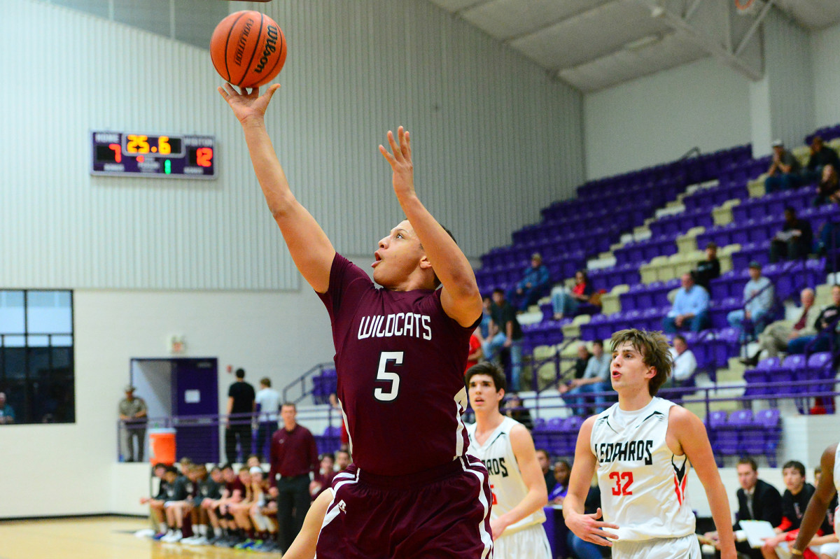 Patrick Mahomes drives to the basket in a high school game while playing for Whitehouse High School outside of Dallas. Mahomes's has revolutionized the quarterback position in the NFL with a few basketball twists.