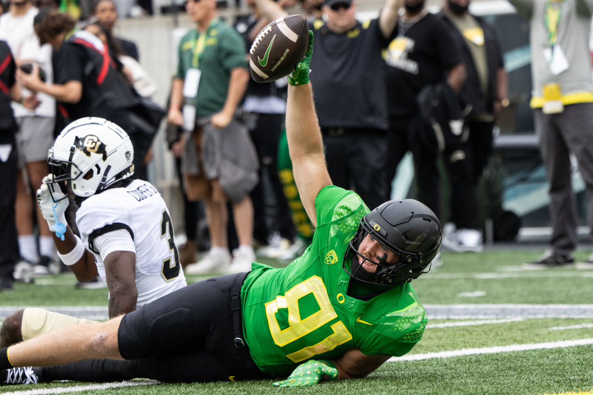 Oregon Ducks tight end Casey Kelly celebrates a touchdown against the Colorado Buffaloes.