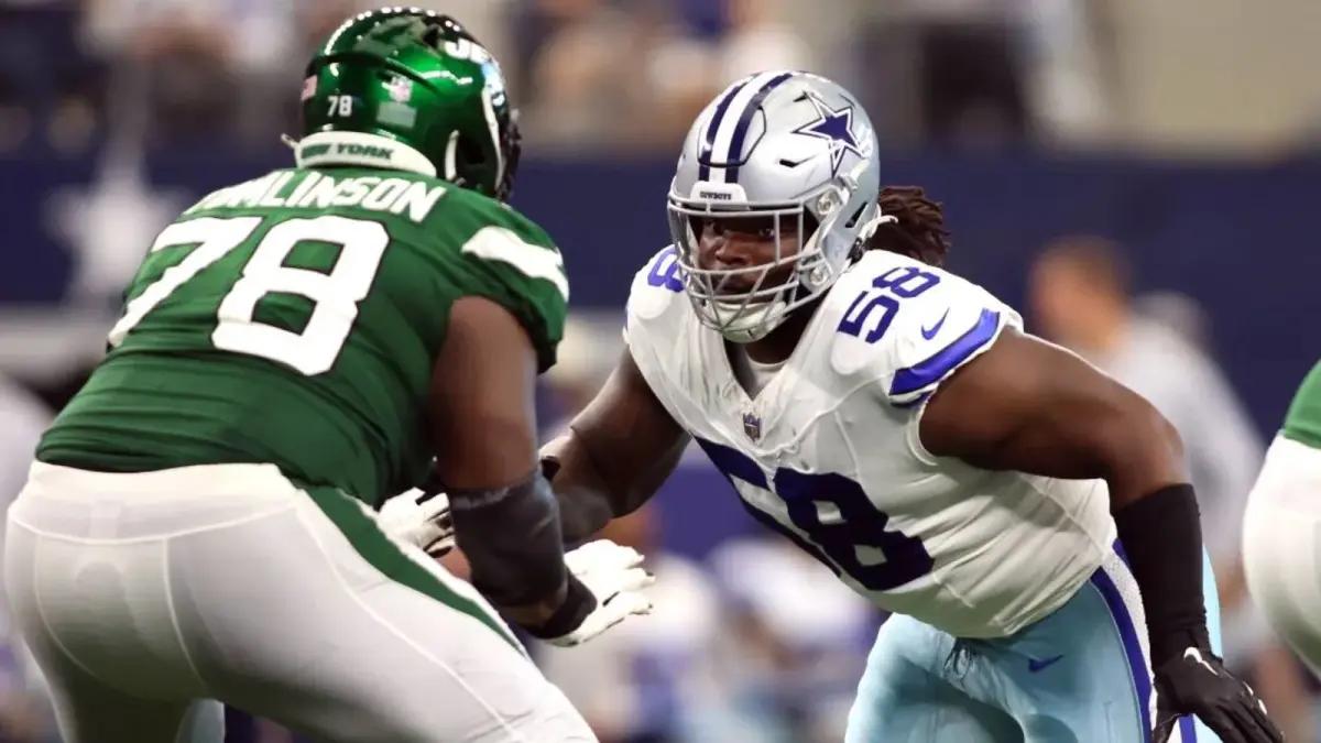 Dallas' Mazi Smith takes on the Jets' Laken Tomlinson.