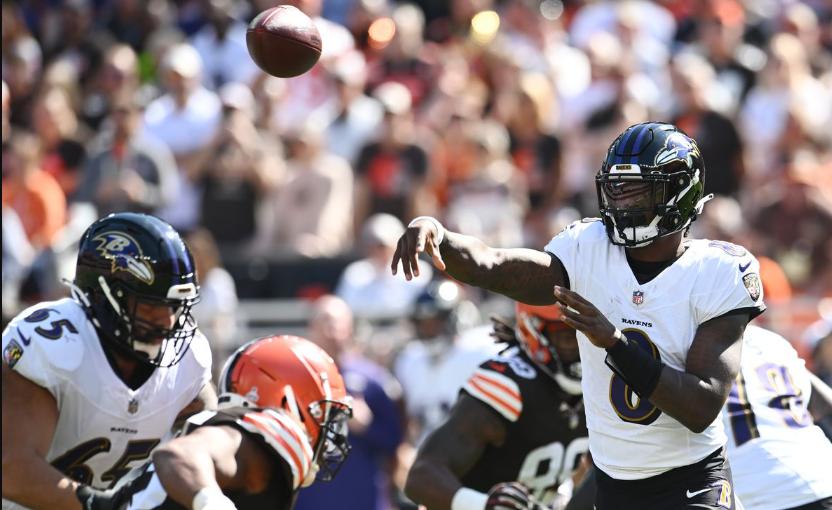 Lamar Jackson (8) lets it fly in the Ravens' 28-3 victory over the Cleveland Browns on Sunday