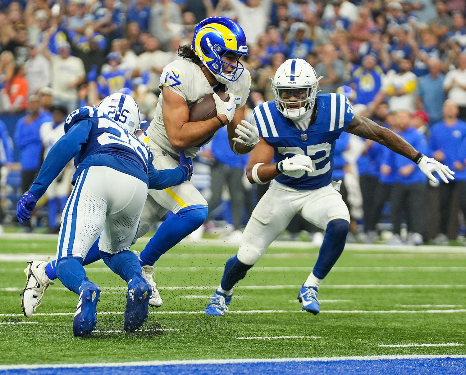 Los Angeles Rams wide receiver Puka Nacua (17) dives into the end zone for the game-winning touchdown against the Indianapolis Colts at Lucas Oil Stadium Sunday. The Rams won 29-23.