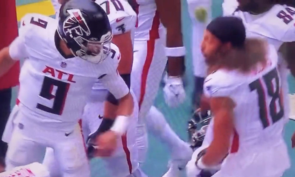 Mack Hollins (18) vents his frustration with Desmond Ridder (9)