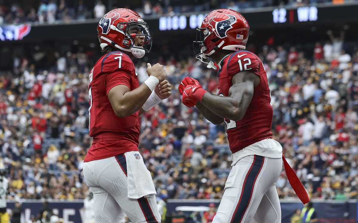 Oct 1, 2023; Houston, Texas, USA; Houston Texans quarterback C.J. Stroud (7) celebrates with wide receiver Nico Collins (12) after a touchdown during the game against the Pittsburgh Steelers at NRG Stadium. 