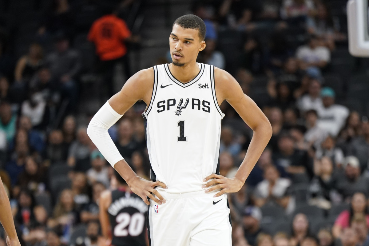 Oct 13, 2023; San Antonio, Texas, USA; San Antonio Spurs center Victor Wembanyama (1) reacts during the first half against the Miami Heat at Frost Bank Center.