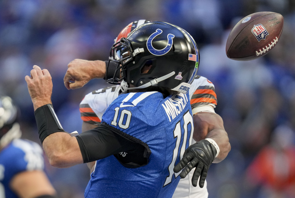 Oct 22, 2023; East Rutherford, New Jersey, USA; Cleveland Browns defensive end Myles Garrett (95) sacks Indianapolis Colts quarterback Gardner Minshew II (10) on during a game against the Cleveland Browns at Lucas Oil Stadium.