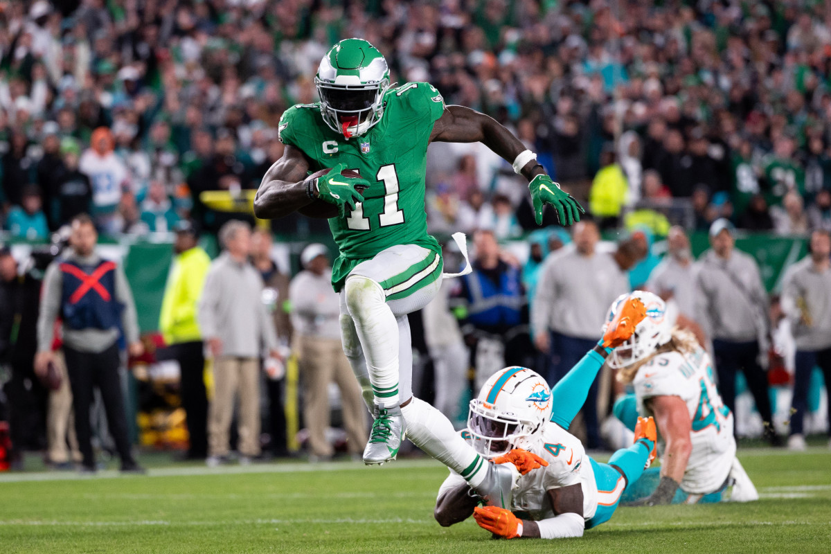 Philadelphia Eagles wide receiver A.J. Brown (11) runs for a touchdown past Miami Dolphins cornerback Kader Kohou (4) after his catch during the third quarter at Lincoln Financial Field.