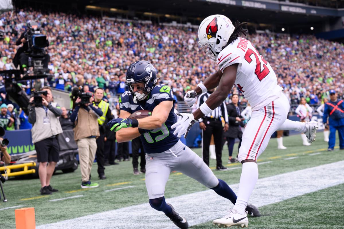 Seattle Seahawks wide receiver Jake Bobo (19) catches a pass for a touchdown over Arizona Cardinals cornerback Starling Thomas V (24) during the first half at Lumen Field.