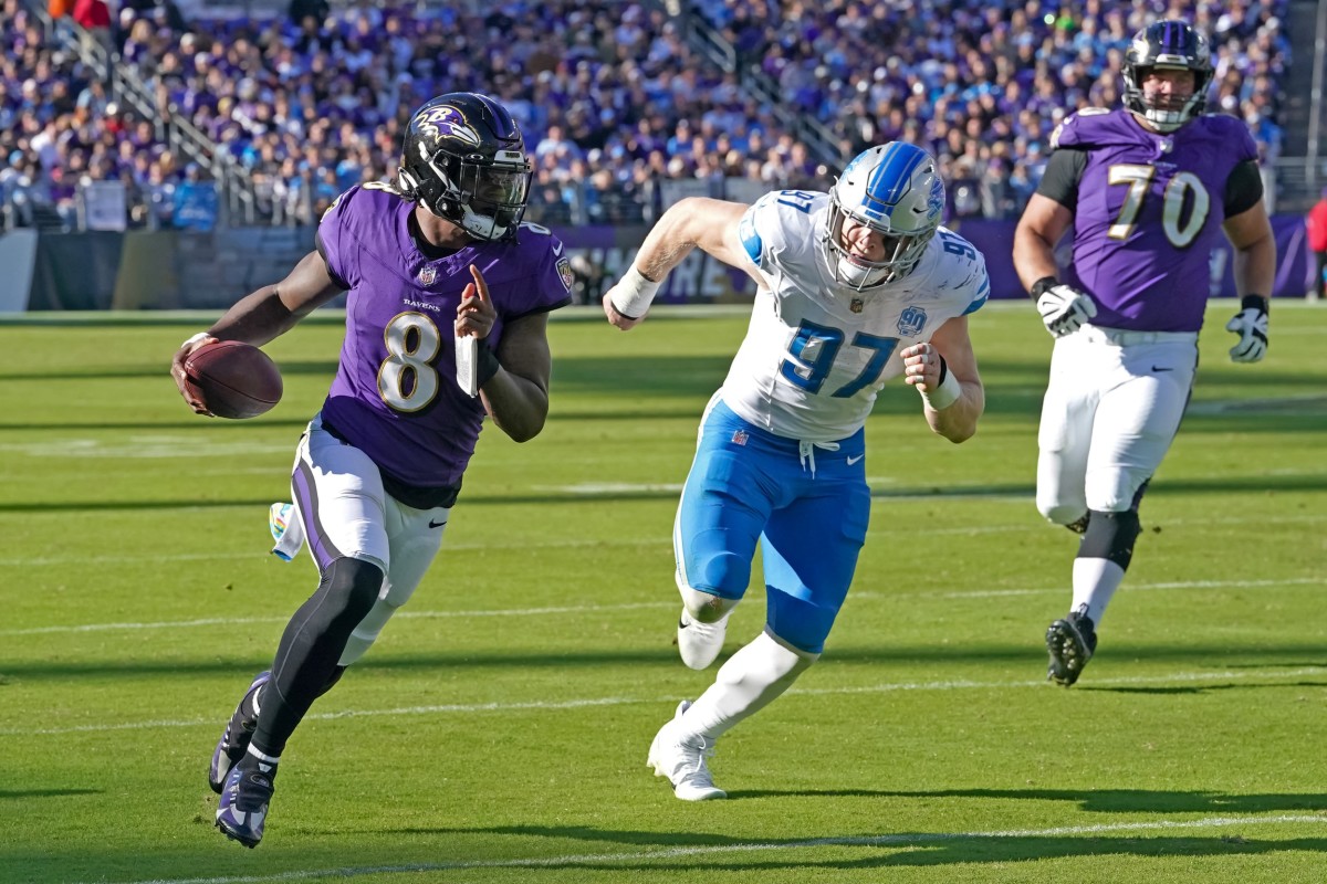 Ravens quarterback Lamar Jackson threw three touchdown passes and ran for another in Baltimore's rout of the Lions on Sunday in Week 7.