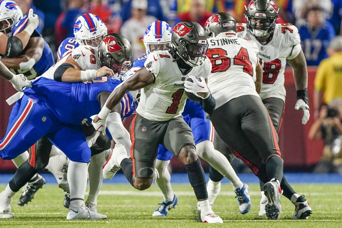 Oct 26, 2023; Orchard Park, New York, USA; Tampa Bay Buccaneers running back Rachaad White (1) runs with the ball against the Buffalo Bills during the first half at Highmark Stadium. Mandatory Credit: Gregory Fisher-USA TODAY Sports