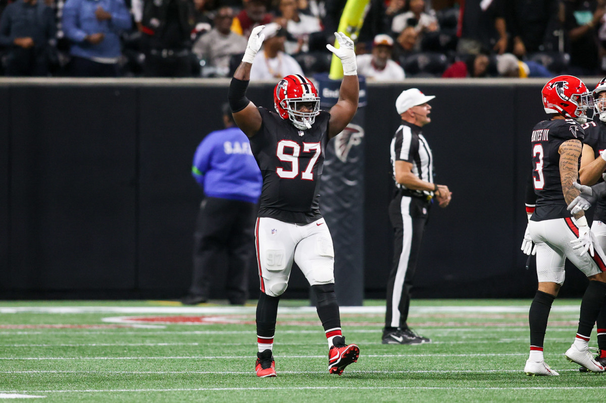 Oct 15, 2023; Atlanta, Georgia, USA; Atlanta Falcons defensive end Grady Jarrett (97) reacts on the field against the Washington Commanders in the second quarter at Mercedes-Benz Stadium. 